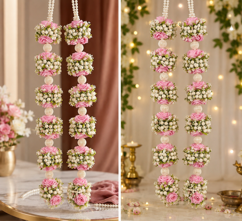 Beautifully Light Pink Roses with crafted Mogra flowers and pearls Varmala / Jailmala , featuring elegant floral detailing and rich traditional accents. A perfect choice to add a graceful touch to your special wedding ceremony.(comes in one pair)