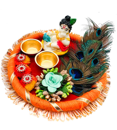 Beautiful Krishna Murti decorated in plate with peacock feather and Jyoti stand attached