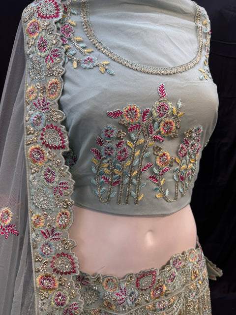 (Video clip attached ) Netting Based Beautiful Heavy Embroidered Peacock Design & Sequined With Stone Work Heavy Ken Ken Big Flare Stitched Lehnga & Blouse With Attached Tessels & Heavy Lace Border Beaded Work Dupatta