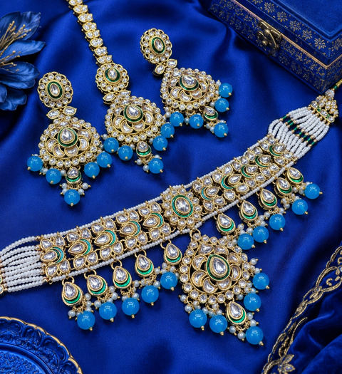 Beautiful Kundan and pearls work classy choker set with beautiful earrings & Tikka