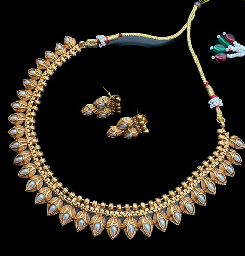 Mat look antique gold traditional necklace set with pearls and kundan work