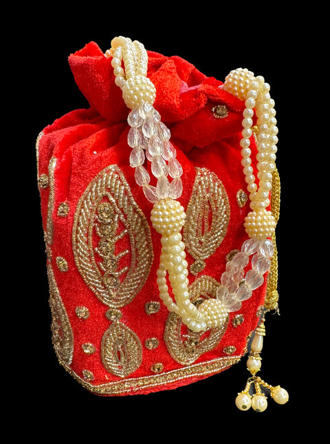 Velvet based pearls with stones  work hand bag /potli bag