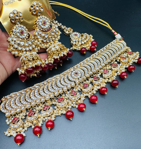 Kundan with pearls work beautiful heavy work choker necklace with designer Jhumka Earrings and Tikka