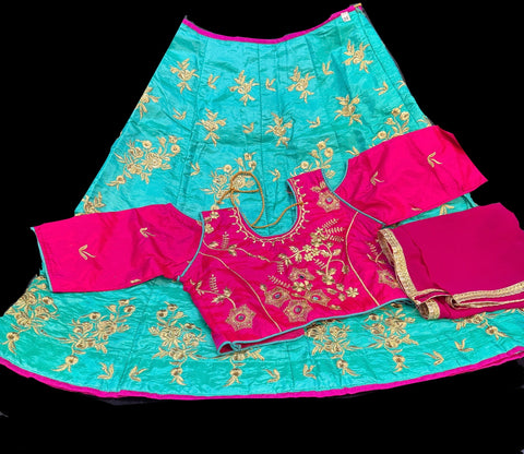 Hot pink silk blouse with turquoise colour embroidered lehnga