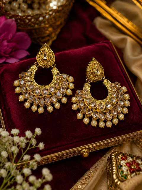 Elegant Golden color Kundan Earrings with Adorned with Delicate Pearl Drops