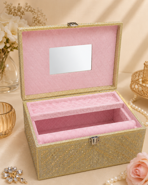 Elegant & spacious bangle box featuring a sparkling stone-studded finish, soft pink velvet interior, and a built-in mirror. Perfect for keeping your bangles and jewellery beautifully organised and protected
Approx. Size: 29× 20 × 17 cm