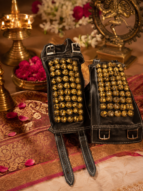 Traditional Bharatanatyam Ghungroo 5 lines 
Beautifully crafted on a durable semi-leather base, featuring rows of golden brass bells for the perfect traditional dance look and sound. (slight variations in colour and design is possible)