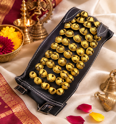 Traditional Bharatanatyam Ghungroo 5 lines 
Beautifully crafted on a durable semi-leather base, featuring rows of golden brass bells for the perfect traditional dance look and sound. (slight variations in colour and design is possible)