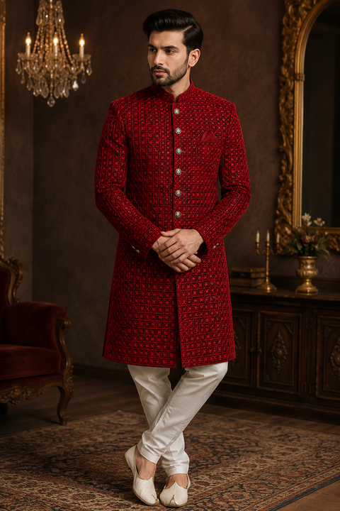 Luxurious Deep Red Maroon sequin embroidered sherwani with intricate geometric detailing, crafted for a bold and sophisticated wedding celebration look. Slight variation in color and design may occur.