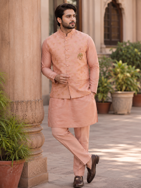 Bright peach floral jacquard waistcoat set with a matching kurta and straight pants, designed to add timeless elegance to weddings, festive celebrations, and special occasions.