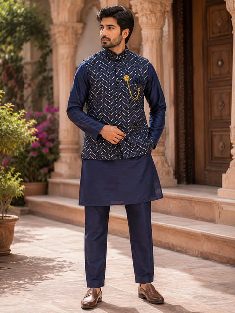 Premium Navy Blue Kurta Set with an Elegant Embellished Jacket, crafted for weddings, festive occasions, and evening celebrations. Slight variation in color and design may occur.