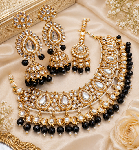 Kundan stone with pearls beaded necklace set with beautiful earrings & tikka
