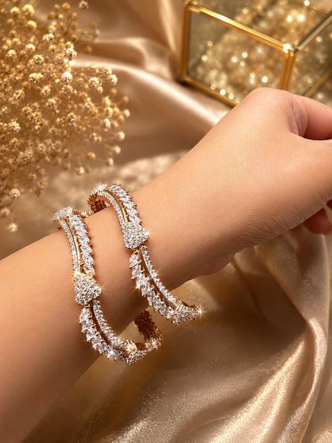 Sparkle with timeless elegance – Premium American Diamond crystal shine bangles in a luxurious rose gold finish.(Slight variations in color and design is possible)