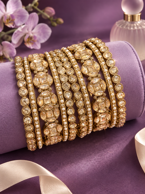 Beautiful bangle set featuring sparkling polki stones (Slight variations in color & design is possible )