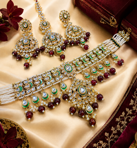Beautiful Kundan and pearls work classy choker set with beautiful earrings & Tikka