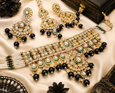 Beautiful Kundan and pearls work classy choker set with beautiful earrings & Tikka