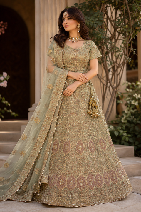 (Video clip attached)SIZE 42 (Upto 46))Lite Mint colour netting Based Beautiful Embroidery With Fine Stones& beaded pearl work Heavy flared Designer semi/Bridal Lehnga With Tessels Attached To Blouse & Lehnga(slight variation in color & design is possible