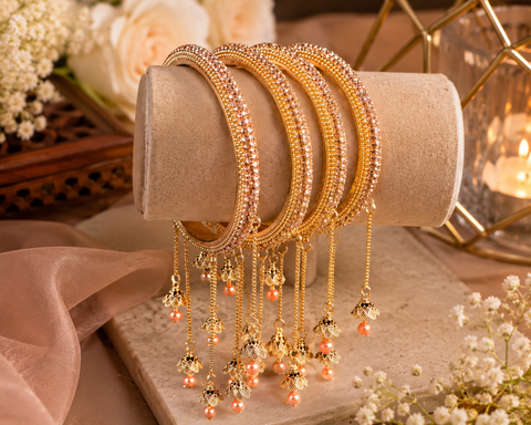 Beautiful Golden fine stone shiny Brass Bangles with Beautiful Latkan set (Sample picture attached at end to show it can be customised with plain Velvet or Metal Bangles)set of 4 Bangles(slight variation in color & design is possible)