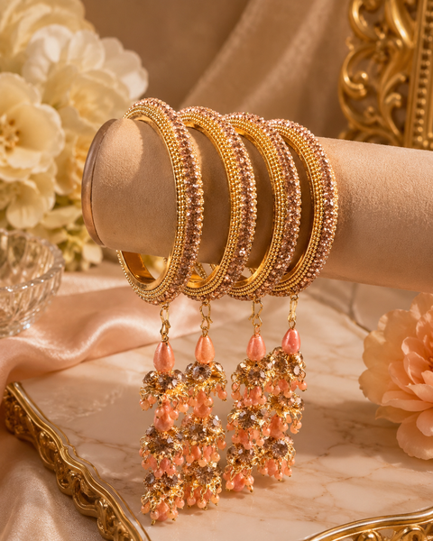 Beautiful Golden fine stone shiny Brass Bangles with Beautiful Latkan set (Sample picture attached at end to show it can be customised with plain Velvet or Metal Bangles)set of 4 Bangles. (Slight variation in color and design is possible)