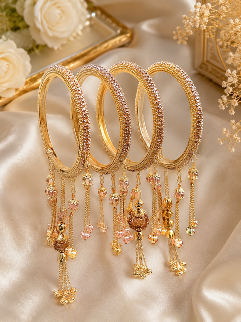 Beautiful Golden fine stone shiny Brass Bangles with Beautiful Latkan set (Sample picture attached at end to show it can be customised with plain Velvet or Metal Bangles)set of 4 Bangles(slight variation in color & design may occur)