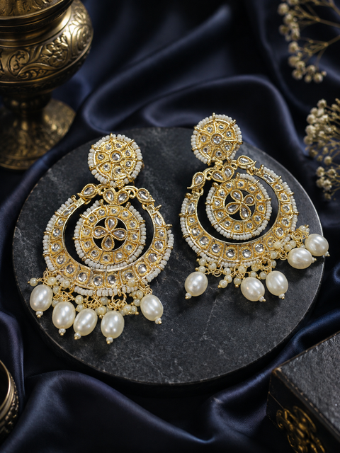 Golden stone with pearls work beautiful earrings