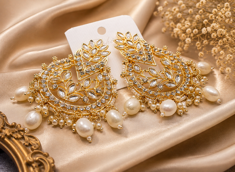 Golden stone with pearls work beautiful earrings