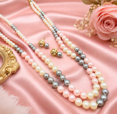 Beautiful pearls necklace with small studs(slight variation in color and design is possible)