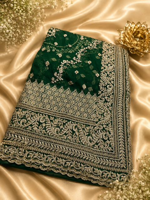 Green Heavy work designer Saree with netting base fabric and stones work design all over with heavy embroidery.The Blouse Worn By The Model Is For Reference Purposes Only. The Actual Blouse Piece Comes Attached With Saree(Slight Variations Are Possible)
