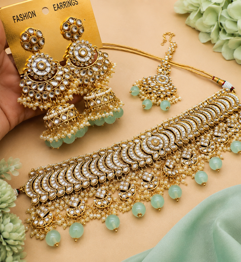 Kundan with pearls work beautiful heavy work choker necklace with designer Jhumka Earrings and Tikka