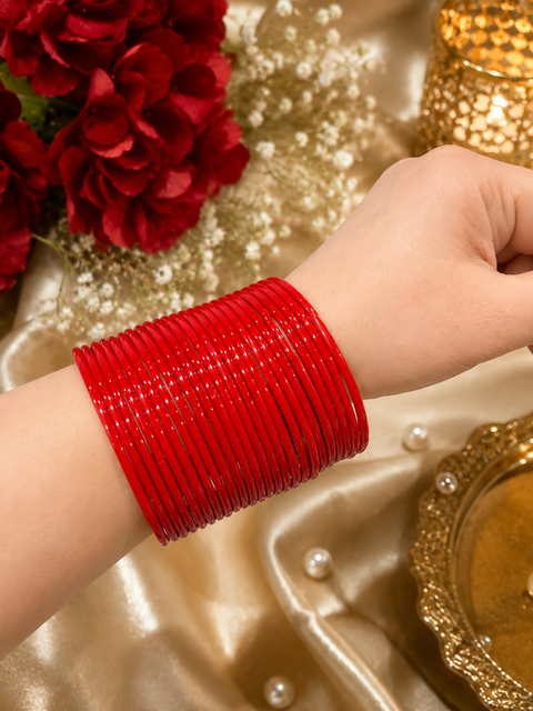 Red color plain glass bangles. Each set includes 2 dozen bangles. Price is per set. Slight colour variation may occur