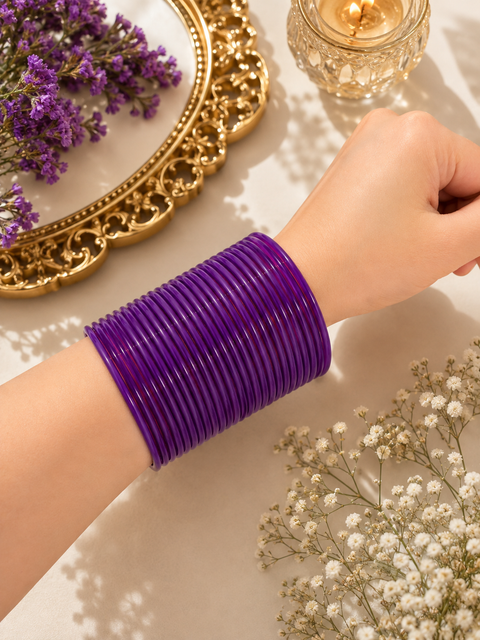 Purple color plain gloss glass bangles. Each set includes 2 dozen bangles. Price is per set. Slight colour variation may occur