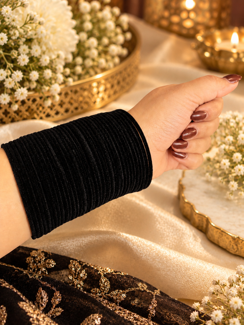 Elegant velvet bangles in a rich Black shade, perfect for festive, bridal and traditional looks. Each pack includes 3 dozen bangles (36 pieces). Price is per pack. Slight variation in colour may be possible