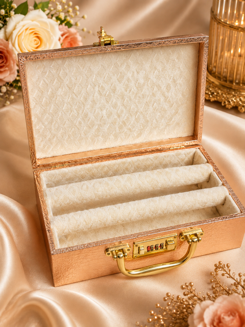 Elegant rose-gold bangle box with mirror detailing, soft velvet interior, secure lock, and spacious bangle holders. Approx. Size: 30 × 17× 9 Cm.