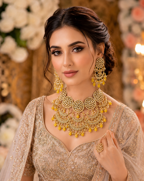 Elegant Kundan necklace set adorned with yellow bead drops and matching earrings. A timeless ethnic design, perfect for weddings, festive celebrations, and special occasions. (Slight variation in color and design is possible)
