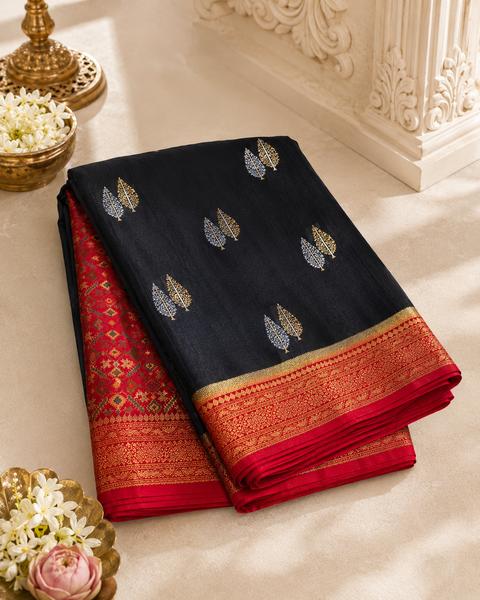 (Video clip attached)Black color saree with Red border & Pallu with beautiful patola design Very Very Soft Pure Dola Silk Beautiful Saree (very soft to set the pleates)