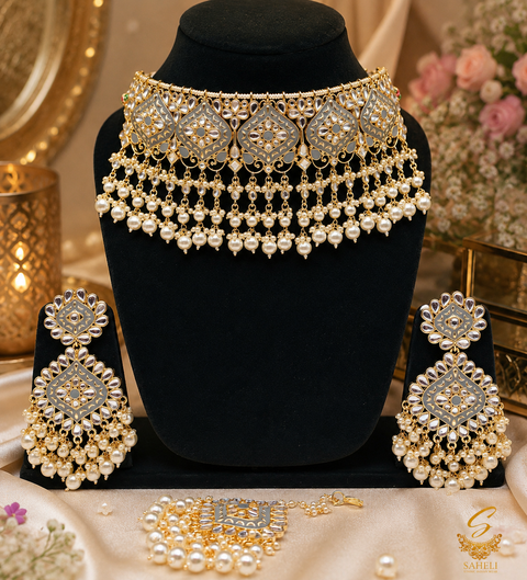Handcrafted Kundan & Meenakari choker set with pearl detailing; (slight variation in color, design, and finishing may occur )