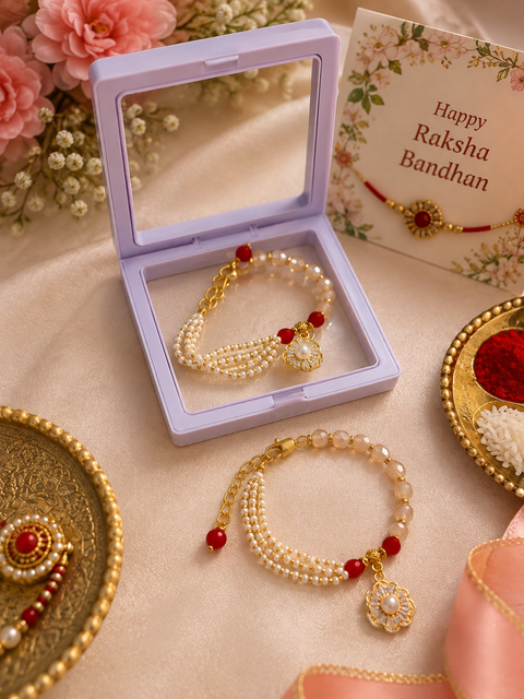 Beautiful Bhabhi Rakhi Bracelet featuring elegant pearl detailing, golden accents and delicate beads. A stylish and graceful Raksha Bandhan piece for your Bhabhi.