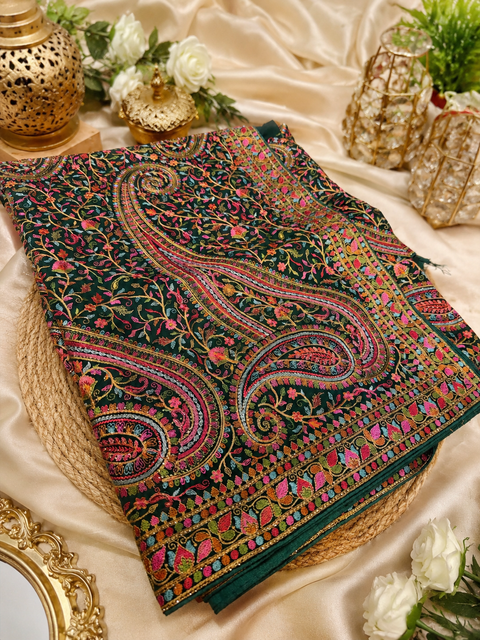 Green color Pure Georgette Chiffon Based Multicoloured Embroidery Work Jaal All Over With Stone Work Beautiful Saree.Comes with matching blouse piece. Model blouse is shown for reference purpose only. Slight variation in color and design may occur