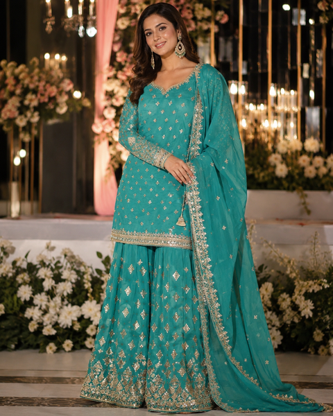 Georgette based sequined and embroidery work kameez with sharara pants and Georgette dupatta (slight variation in color and design is possible)