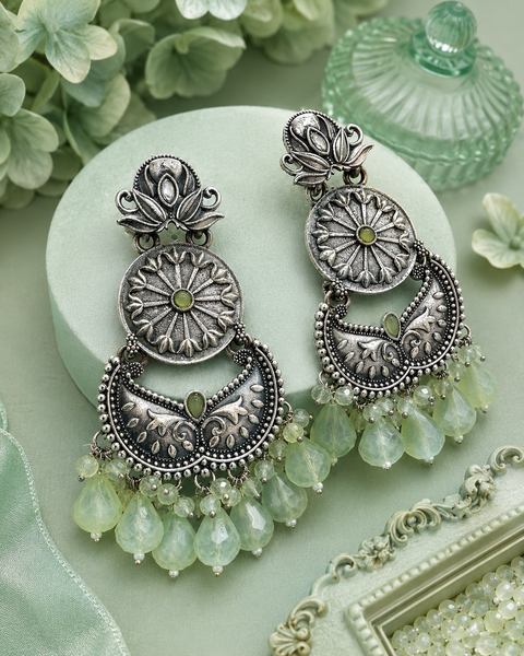 Beautiful oxidised earrings with colourful pearls ( slight variations in color and design is possible)