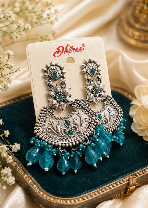 Beautiful oxidised earrings with colourful pearls ( slight variations in color and design is possible)