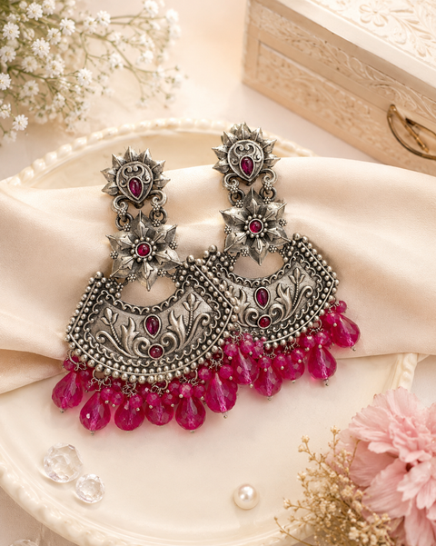Beautiful oxidised earrings with colourful pearls ( slight variations in color and design is possible)