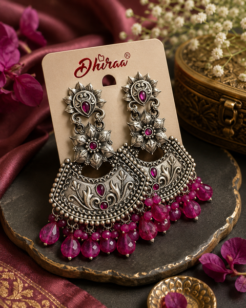 Beautiful oxidised earrings with colourful pearls ( slight variations in color and design is possible)
