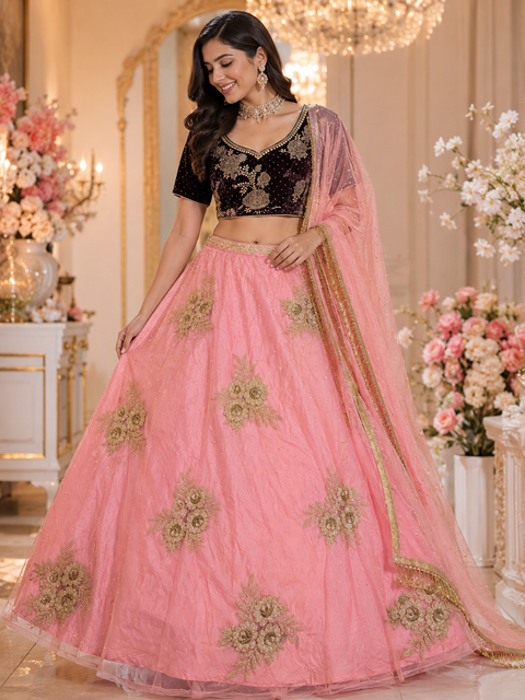 Velvet based stone work Blouse with heavy flared netting based style lehnga and dupatta (slight variation in color and design is possible)