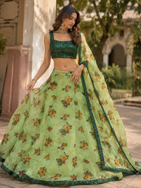 (Video clip attached)Sequin work designer stylish Blouse with very very heavy flared organza based  princess style floral lehnga and dupatta(slight variations in color and design is possible)