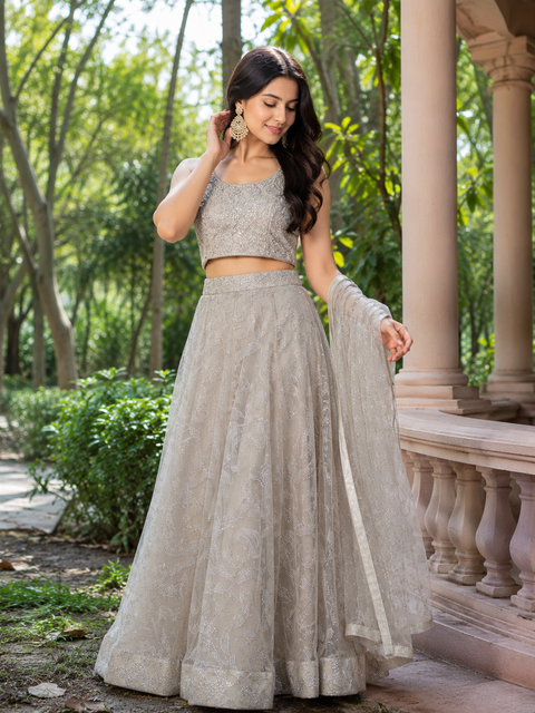 Stones and mirror work designer Blouse with netting shimmer work  design heavy flared lehnga and netting dupatta