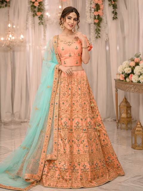 Size 44(upto 48) Peach colour silk based heavy embroidery work on Blouse & Lehnga with heavy work netting dupatta
(slight variation in color and design is possible)