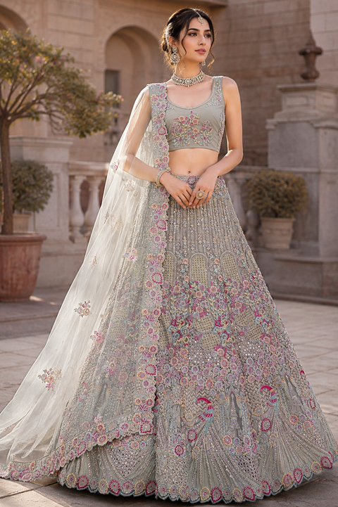 (Video clip attached ) Netting Based Beautiful Heavy Embroidered Peacock Design & Sequined With Stone Work Big Flare Lehnga & Blouse & Border Work Dupatta(slight variation in color and design is possible)UNSTITCHED LEHNGA)