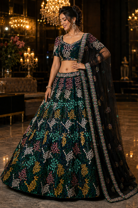 (Video clip attached )Black color  Party wear netting based full of sequined and multi embroidery work multiflared very heavy lehnga with heavy work design in blouse and embroidery dupatta (Unstitched Lehnga)