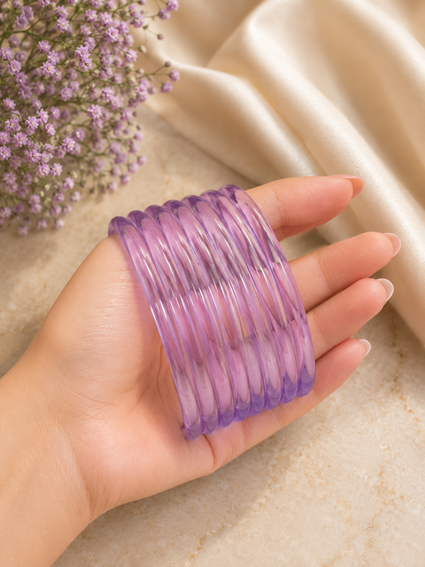 Lavender color Ultra-trendy jelly bangles with glossy vibrant shades — the perfect statement stack to elevate your everyday and festive looks Eight bangles per set (price per set)(slight variation in color and design is possible)